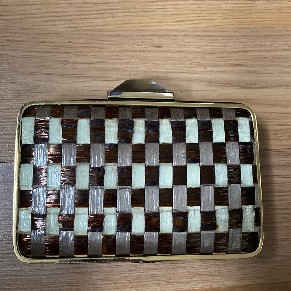 Portable clutch hand bag with checkered.